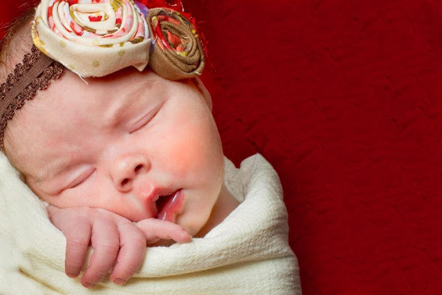 newborn photos of a one-week-old baby girl - The Gifted Gabber