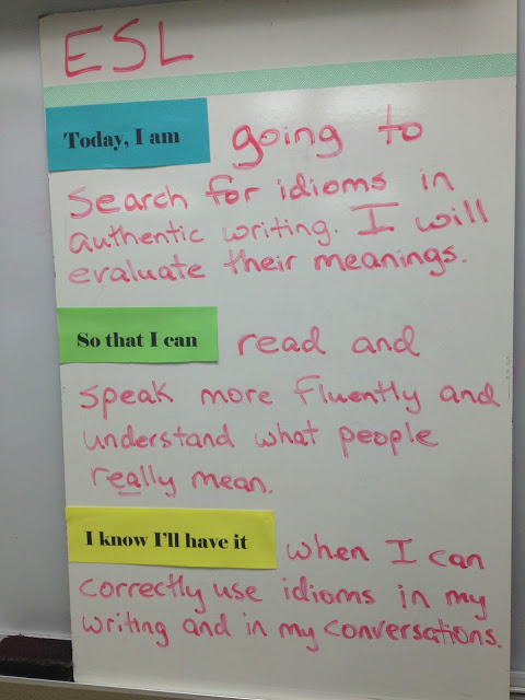 an ESL objective written on the dry erase area