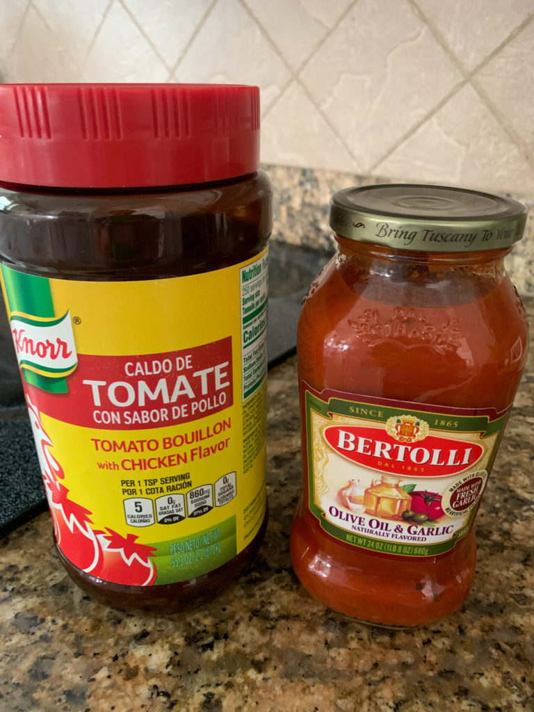 container of Knorr Caldo de Tomate and Bertolli Olive Oil and Garlic