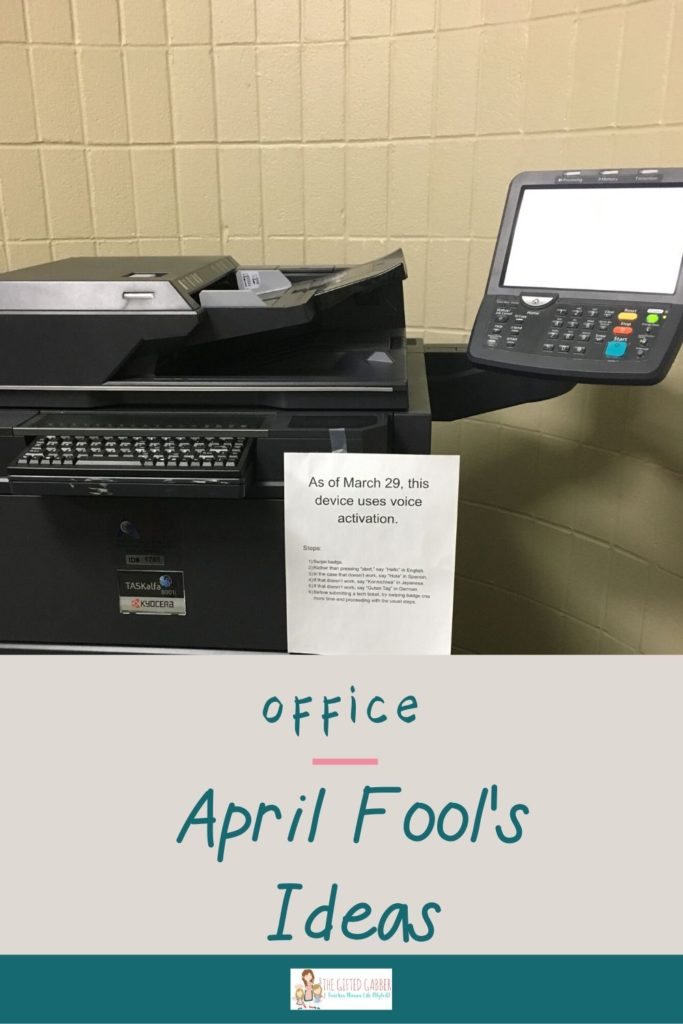 copy machine with sign taped on for April Fool's copy machine prank