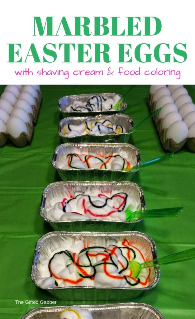 table of shaving cream and food coloring in trays for shaving cream Easter eggs