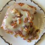 This Butter Pecan Praline Poke Cake Recipe is special enough for a birthday but also easy enough for most anyone to make. It is doctored box cake that tastes so much like homemade, no one will ever know it involves a cake mix! Drizzle on the delicious butter pecan frosting and welcome the compliments! - The Gifted Gabber - #cake #recipes #dessert #birthday #valentines #butterpecan