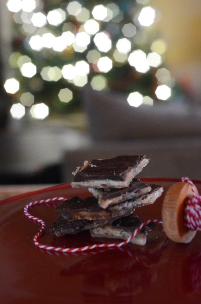 The saltiness of these chocolate toffee cookies (saltine cracker cookies) plays nicely against the sweet chocolate topping. This easy Christmas recipe with saltines is a Christmas tradition in many homes. Sometimes called Christmas crack, this is a special treat with only 4 main ingredients. It is often brought to potlucks and parties during the holidays! #christmas #potluck #party #recipes #treat #dessert