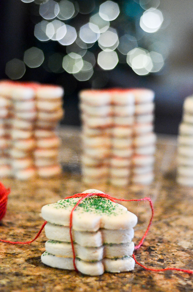 Christmas tree sugar cookies tied together in bundles