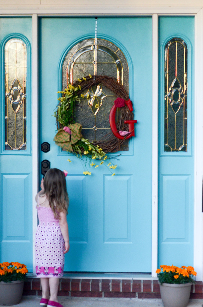 Can you really not be happy when looking at bold turquoise colors on houses? Turquoise and teal add such a fun pop anywhere on the exterior such as with a turquoise door and shutters. Though Sherwin Williams and Benjamin Moore have plenty of fun turquoise colors, this turquoise paint color from Valspar is hard to beat! #door #exteriors #home #paint #homedecor 