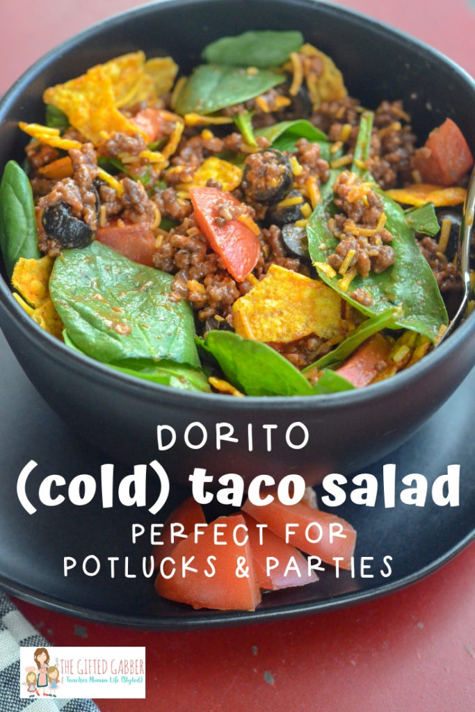 This easy Dorito taco salad is party perfect! It feeds a large crowd, and is served as a cold taco salad - making it perfect for potlucks! This taco salad recipe uses Catalina dressing and Doritos along with typical taco salad toppings for a mixed salad. Also, it can be made as a layered salad, and French dressing could be substituted for the Catalina.