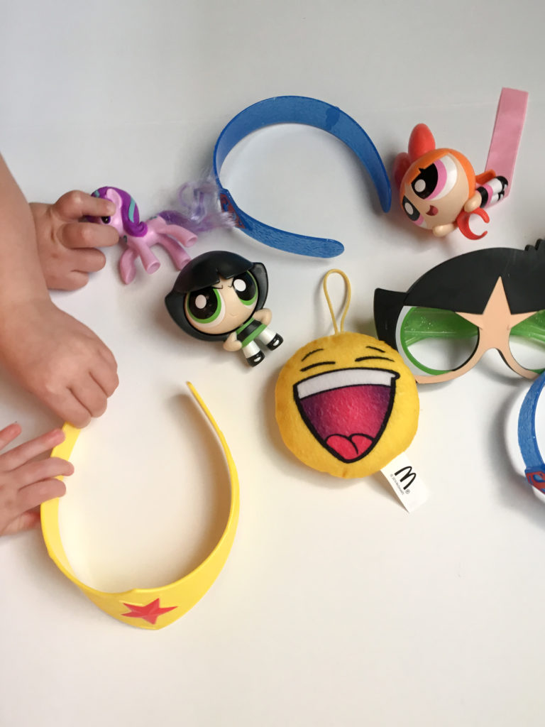 So many surprises in that little box! Wondering what to do with those McDonald's Happy Meal toys your kids have collected? Check out this post for 5 creative ideas for repurposing McDonald's toys. #mcdonalds #toys #forkids #organizing