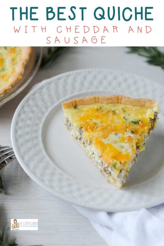 piece of sausage and egg pie (quiche) on white plate with text overlay 