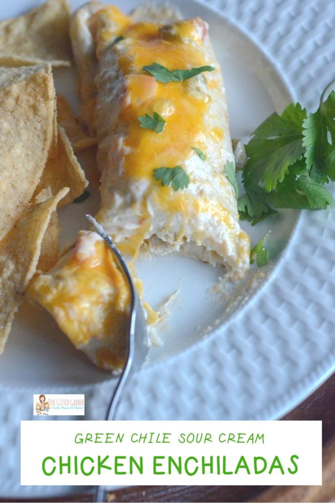 Green Chile Chicken Enchiladas with Sour Cream Sauce - The Gifted Gabber