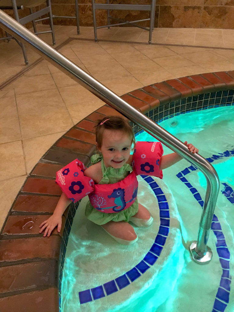  little girl in pool at Hilton Promenade at Branson Landing 