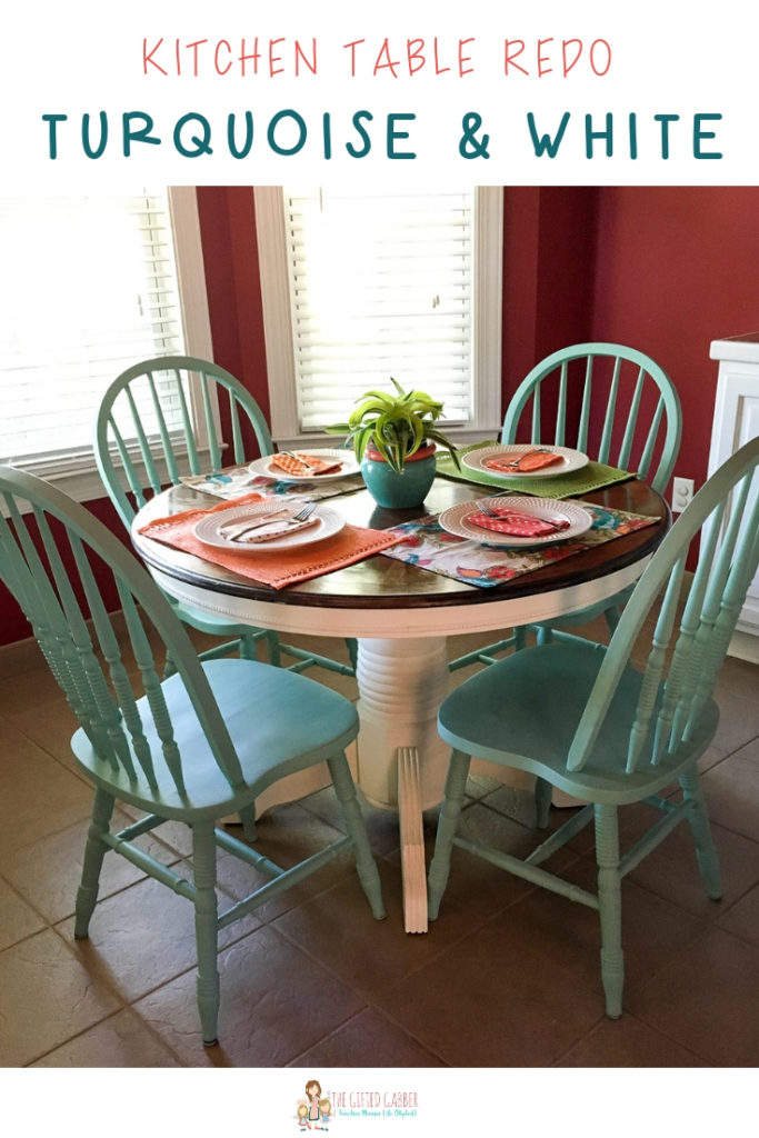 white table with teal chairs