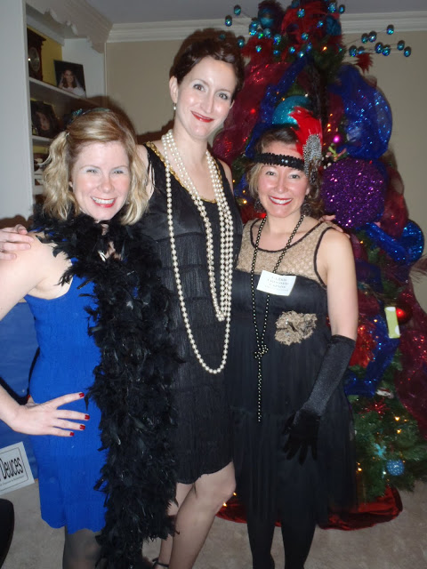 3 women dressed as flappers at 1920s costume party
