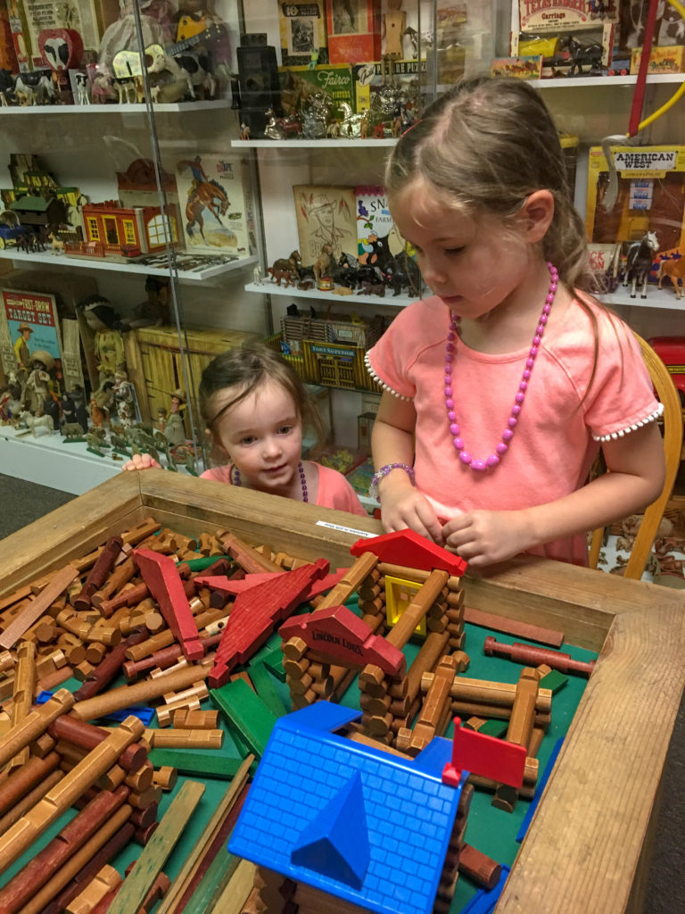 sisters play at the Toy Museum on the Branson Strip 