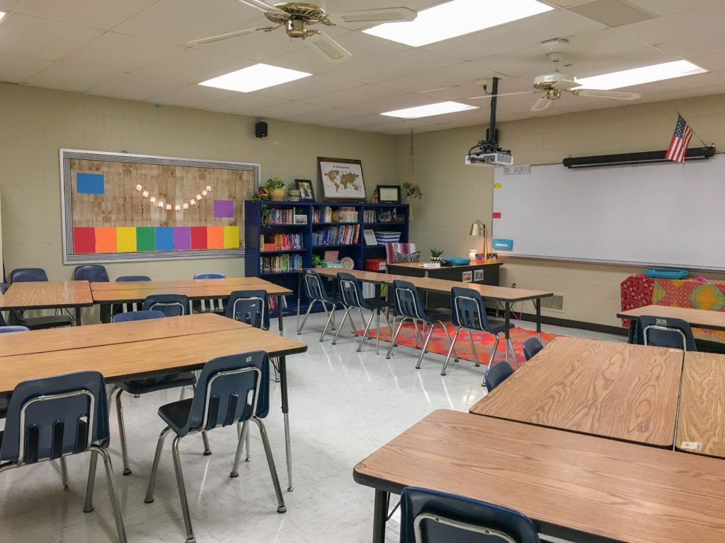side view of a middle school classroom with boho rainbow classroom decor 