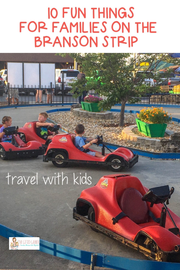 bumper cars with children driving on Branson Strip 
