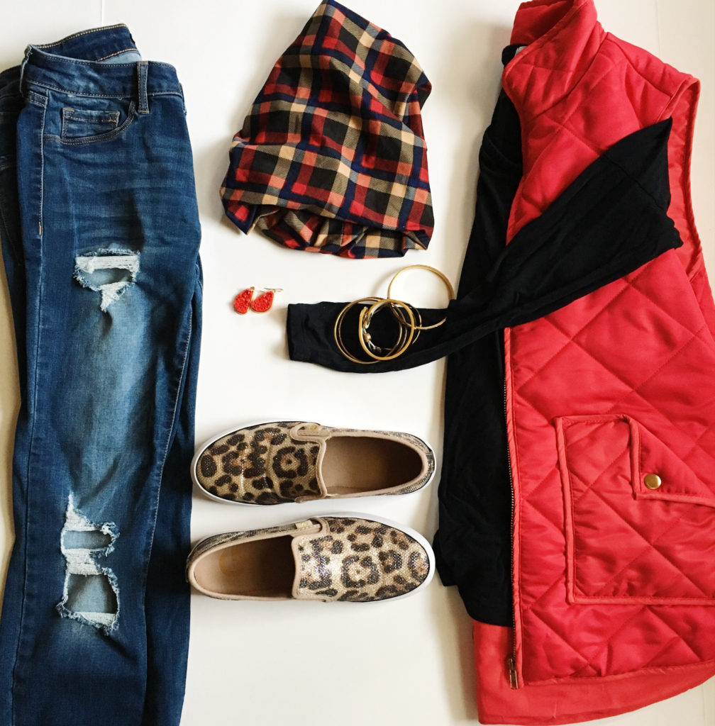 layering outfits flatlay with red vest, leopard sneakers, and plaid beanie hat 