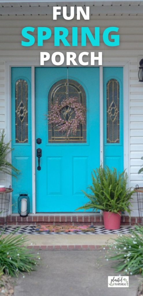 Kimberly Queen ferns on front porch flanking both sides of a painted porch front door with spring front porch ideas