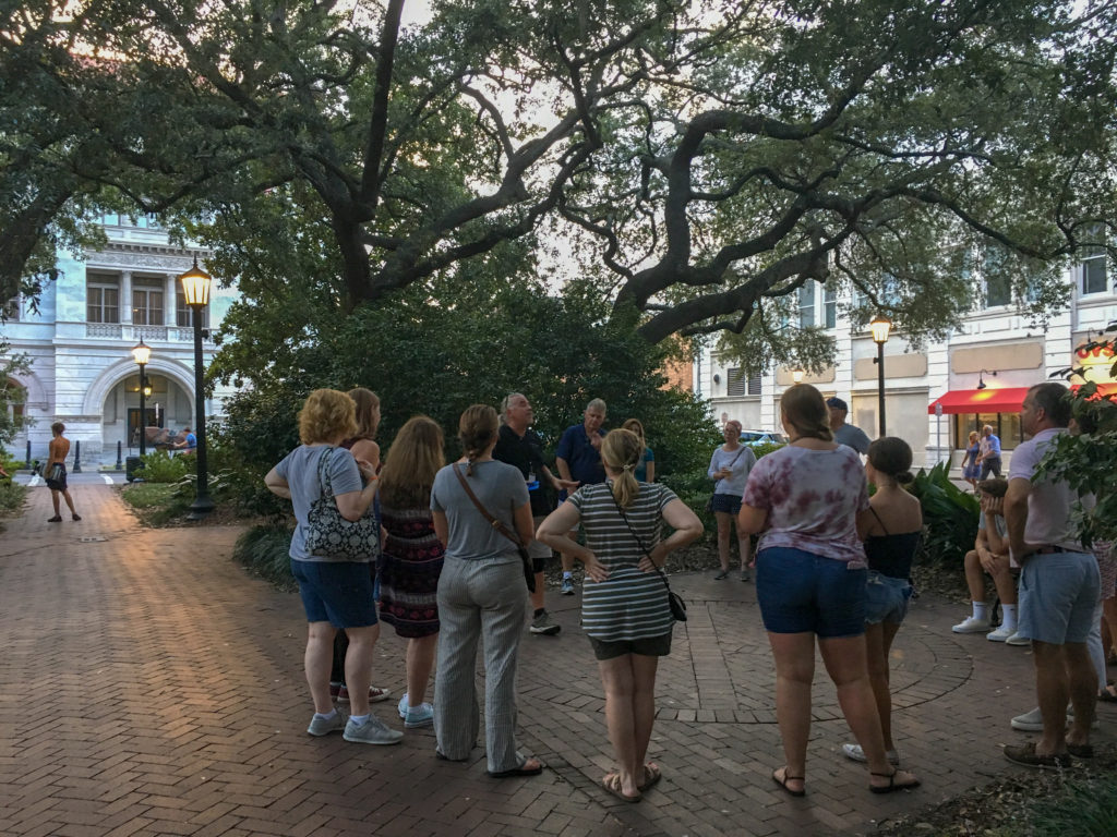 people waiting in Wright Square for the Blue Orb ghost tour