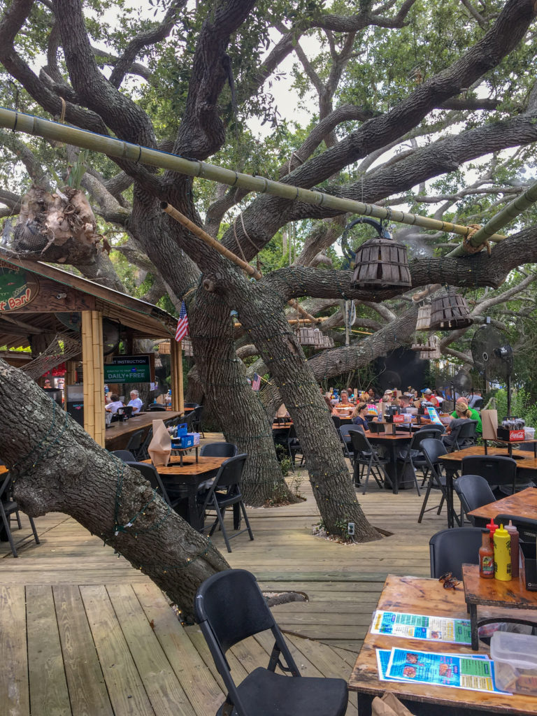 a picture of the outdoor seating area at Crab Shack on Tybee Island during a girls weekend to Tybee Island