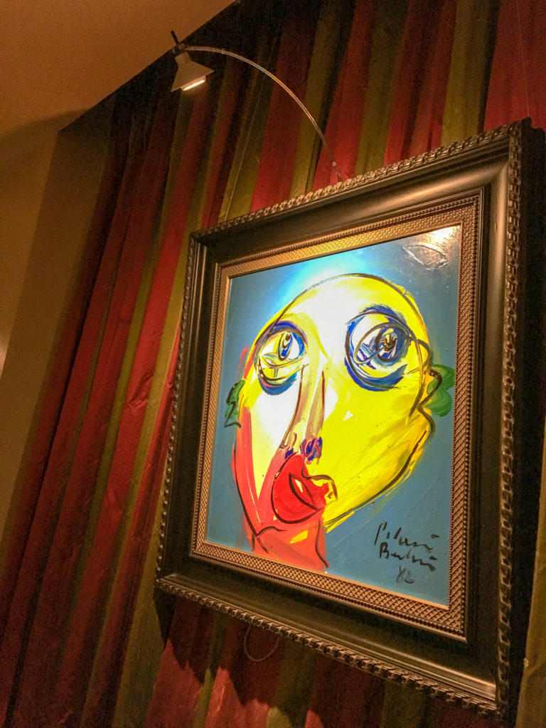 an abstract artwork of a face at The Mansion on Forsyth seen on a girls weekend in Savannah