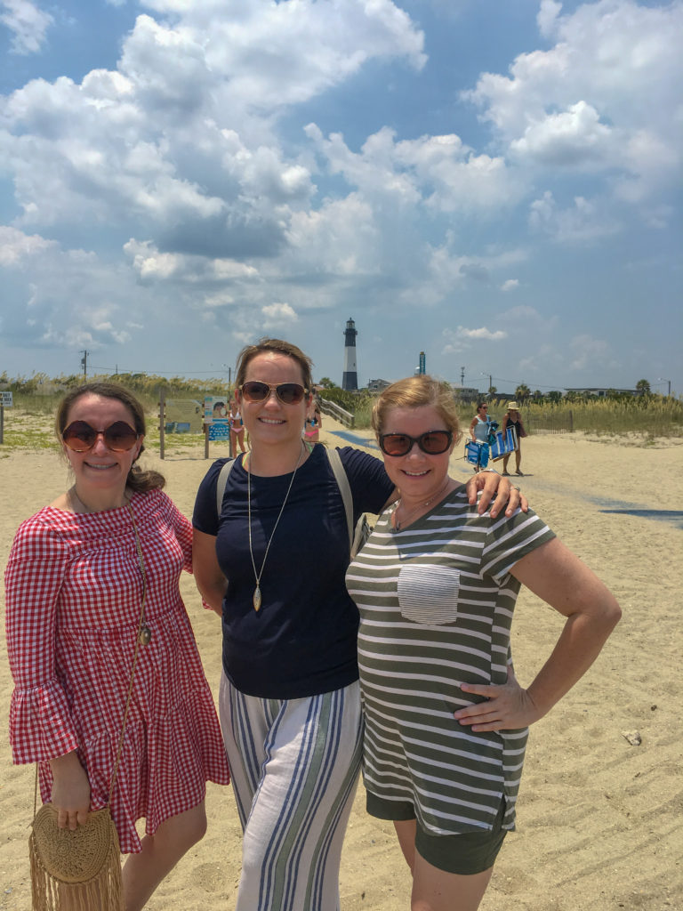 three women stand on North Beach on Tybee Island - girls' weekend in Savannah 