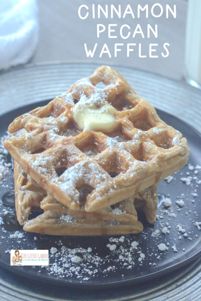 cinnamon waffles on black plate with text overlay