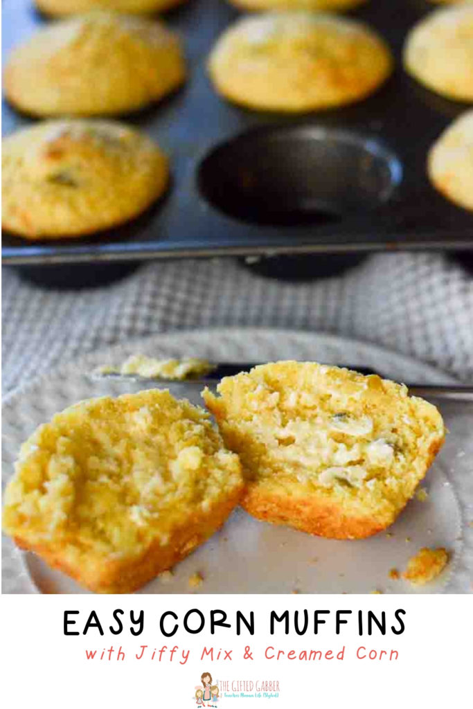 Jiffy cornbread muffin with creamed corn split open on white plate with butter