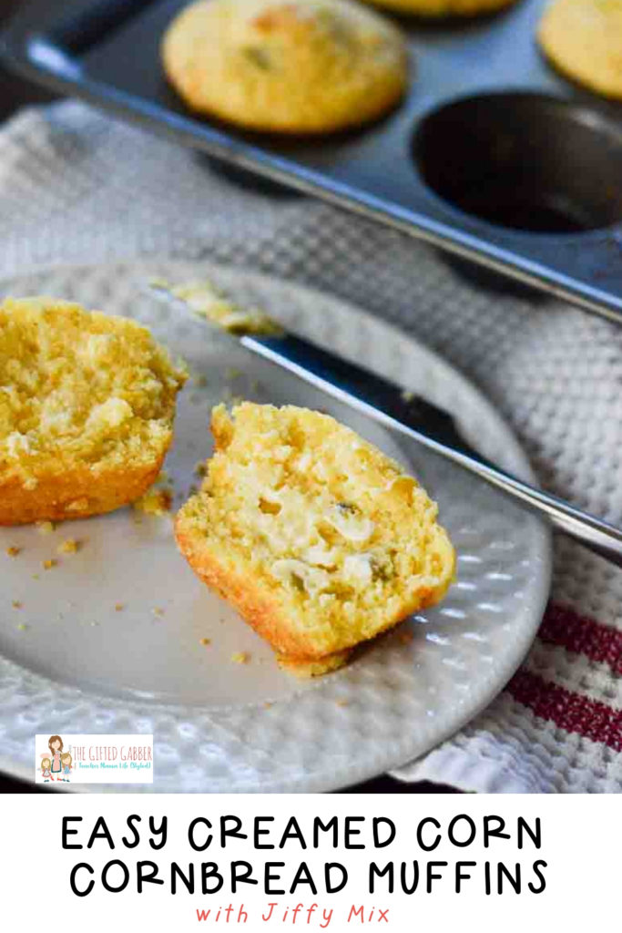 Jiffy cornbread muffin with creamed corn on white plate with knife