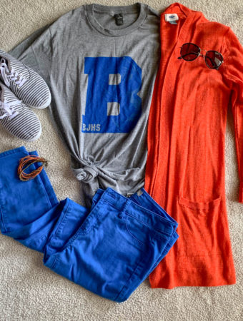 school spirit wear outfit with gray teacher t-shirt, orange cardigan, blue pants, and striped tennis