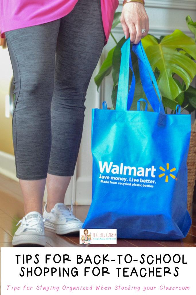 woman stands with walmart bag