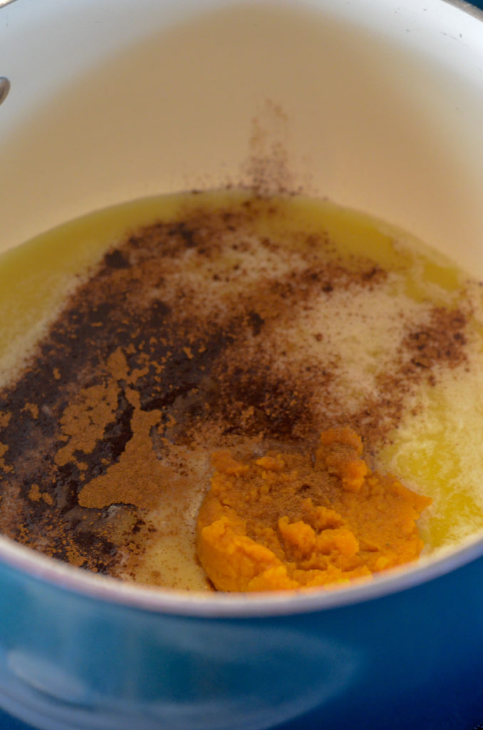 cinnamon butter glaze on stove in blue pot