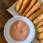 plate of yuca fries with spicy yuca sauce