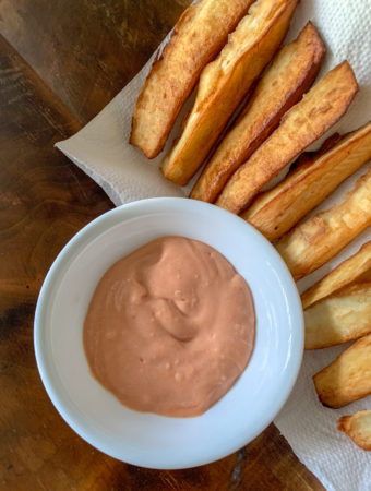 plate of yuca fries with spicy yuca sauce