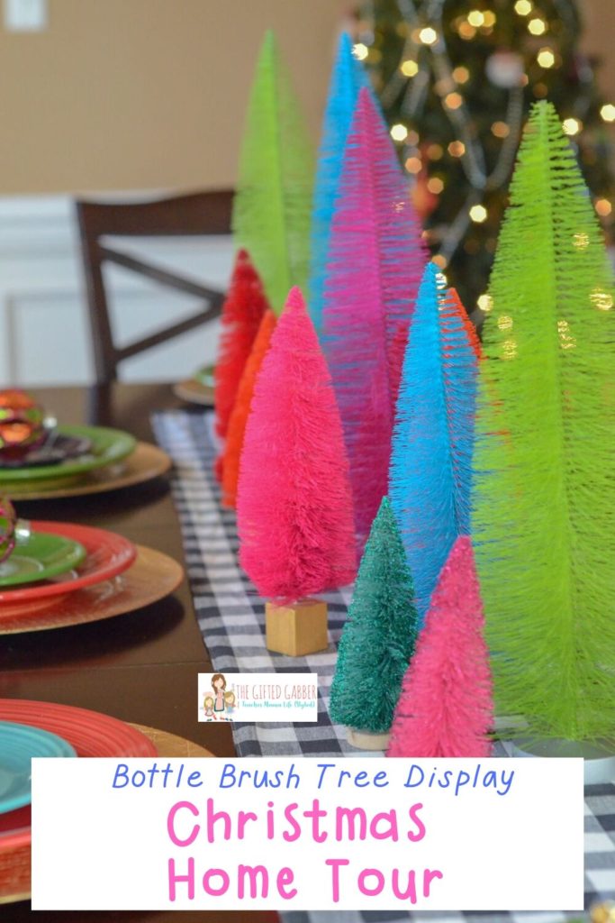 bottle brush trees on holiday table with text overlay