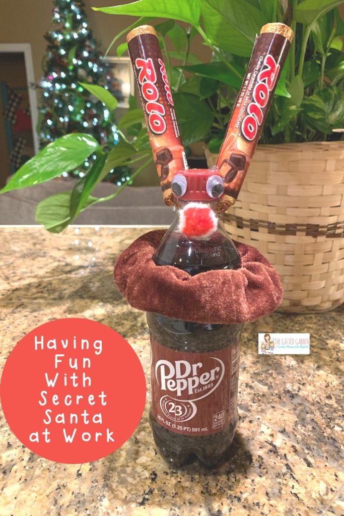a reindeer soda gift with a hair scrunchie collar and Rolos ears as a secret santa gift 