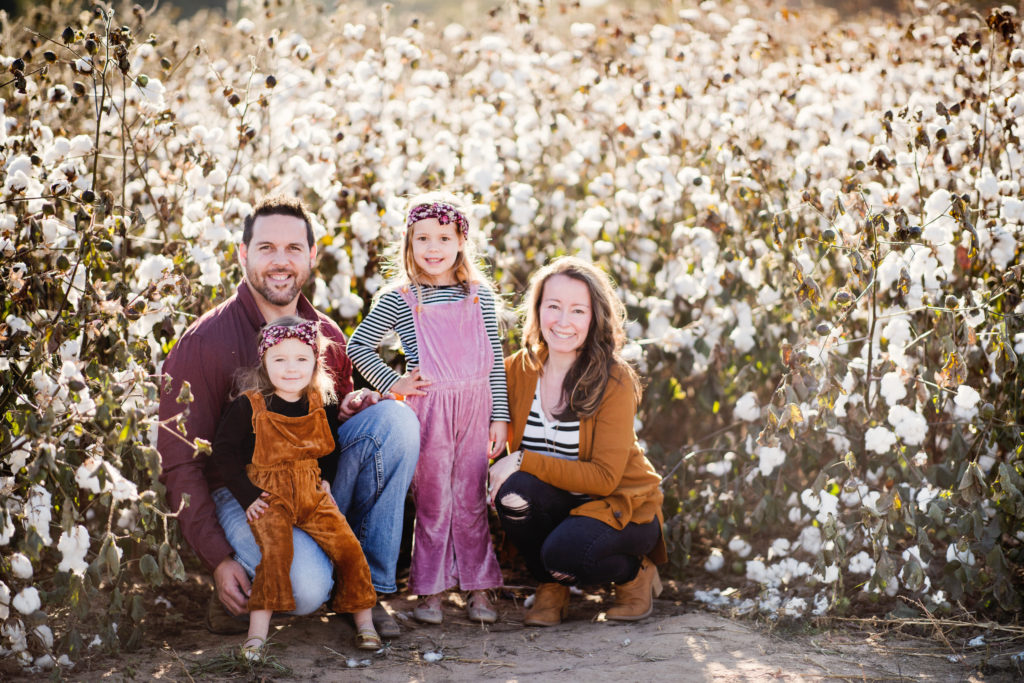 family poses at Mayflower pumpkin patch 