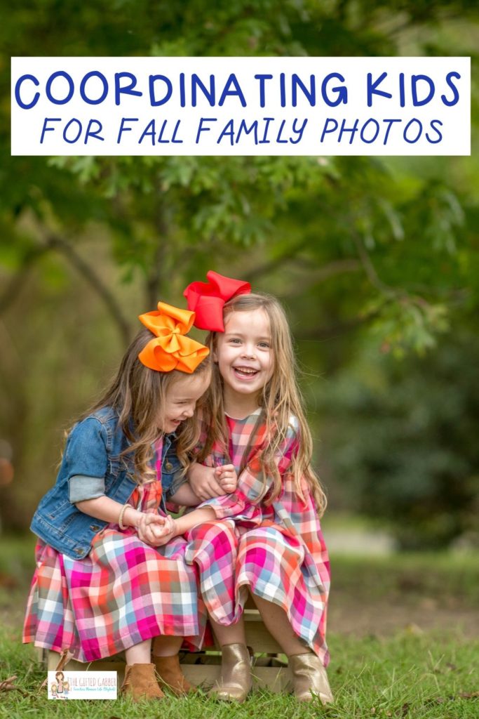 two girls dressed in casual fall outfits for fall family photoshoot