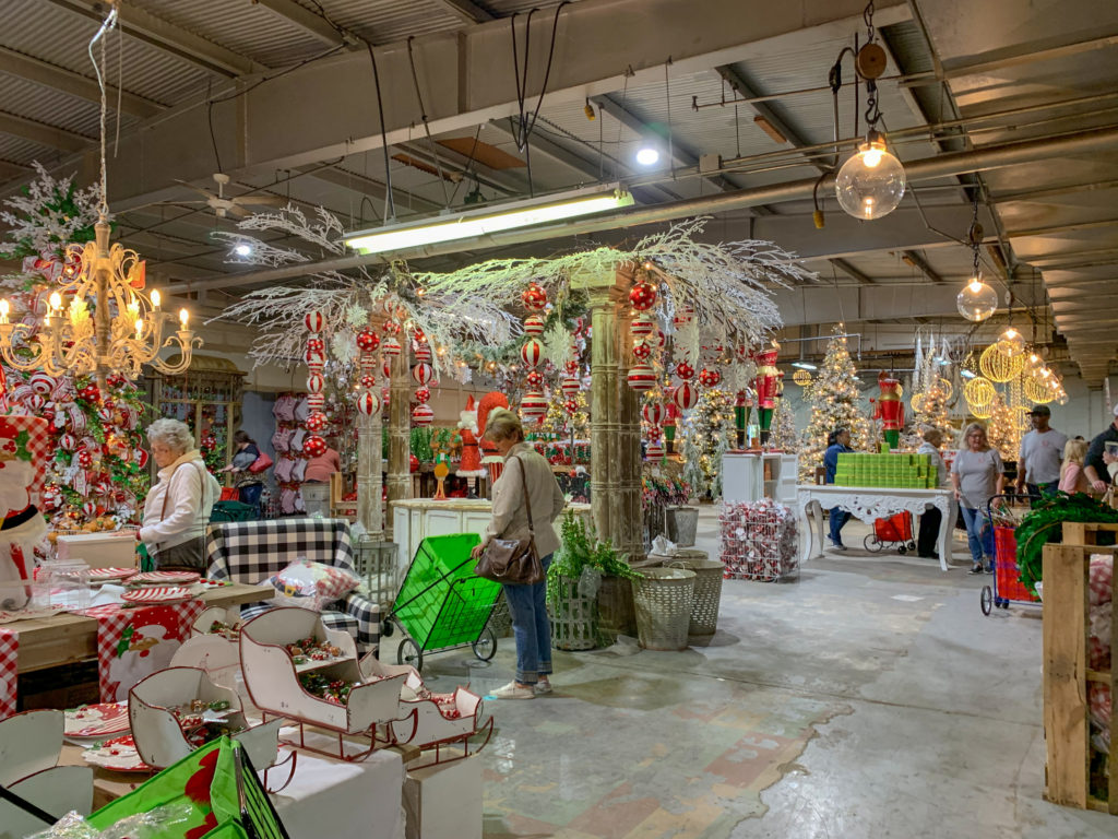 shoppers shop at Guess and Company Christmas Warehouse in Des Arc, AR