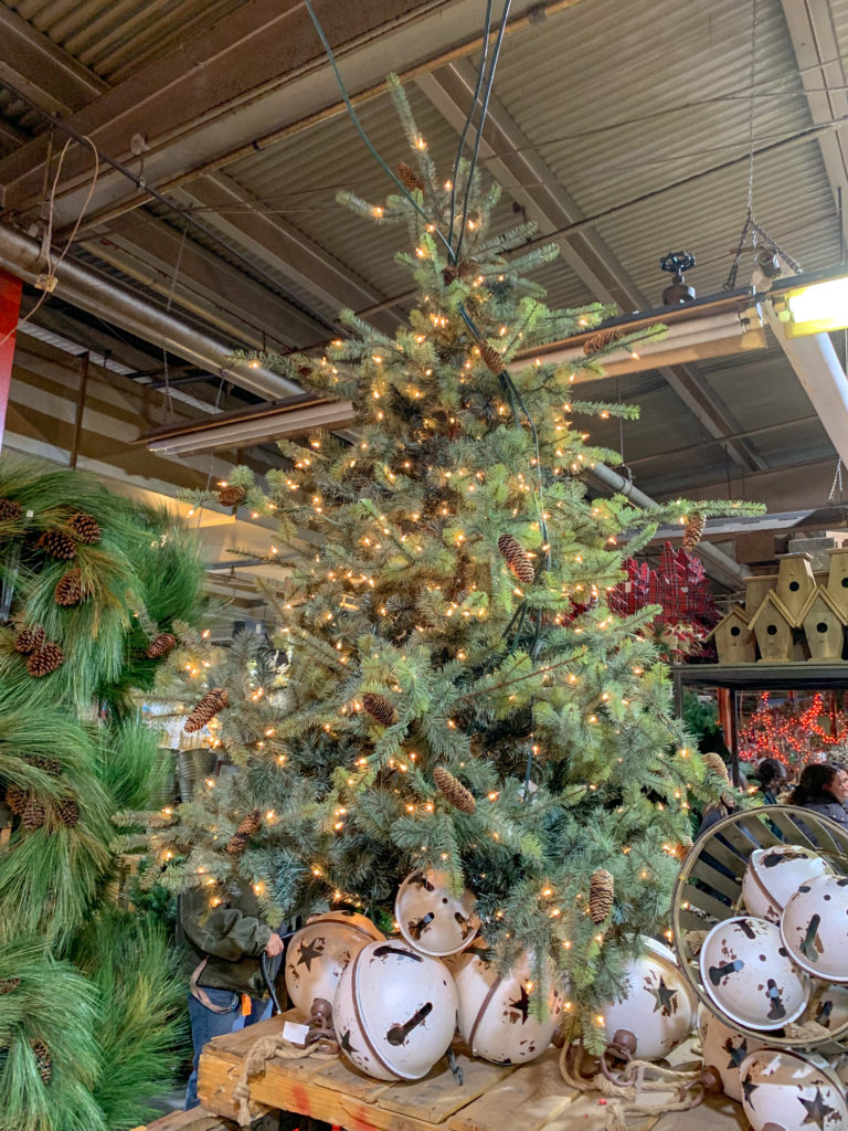 rustic Christmas tree display at Guess and Company 