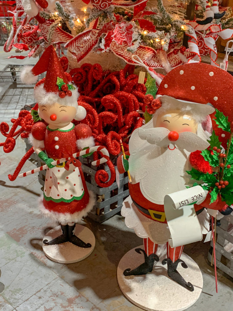 Santa Claus and Mrs. Claus metal Christmas decor at Christmas Warehouse in Des Arc