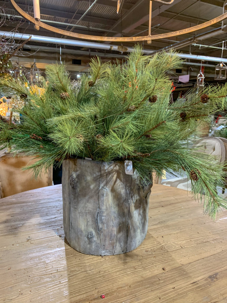 farmhouse Christmas decorations of metal bucket with pine tree branches