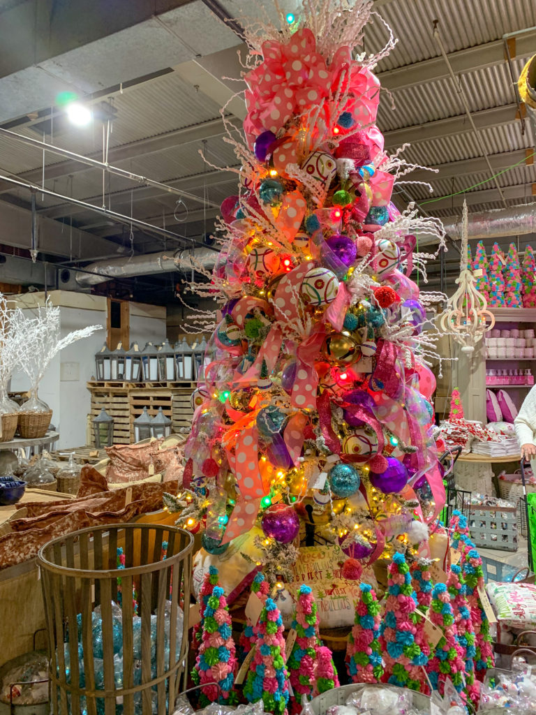 purple Christmas tree with whimsical Christmas decorations
