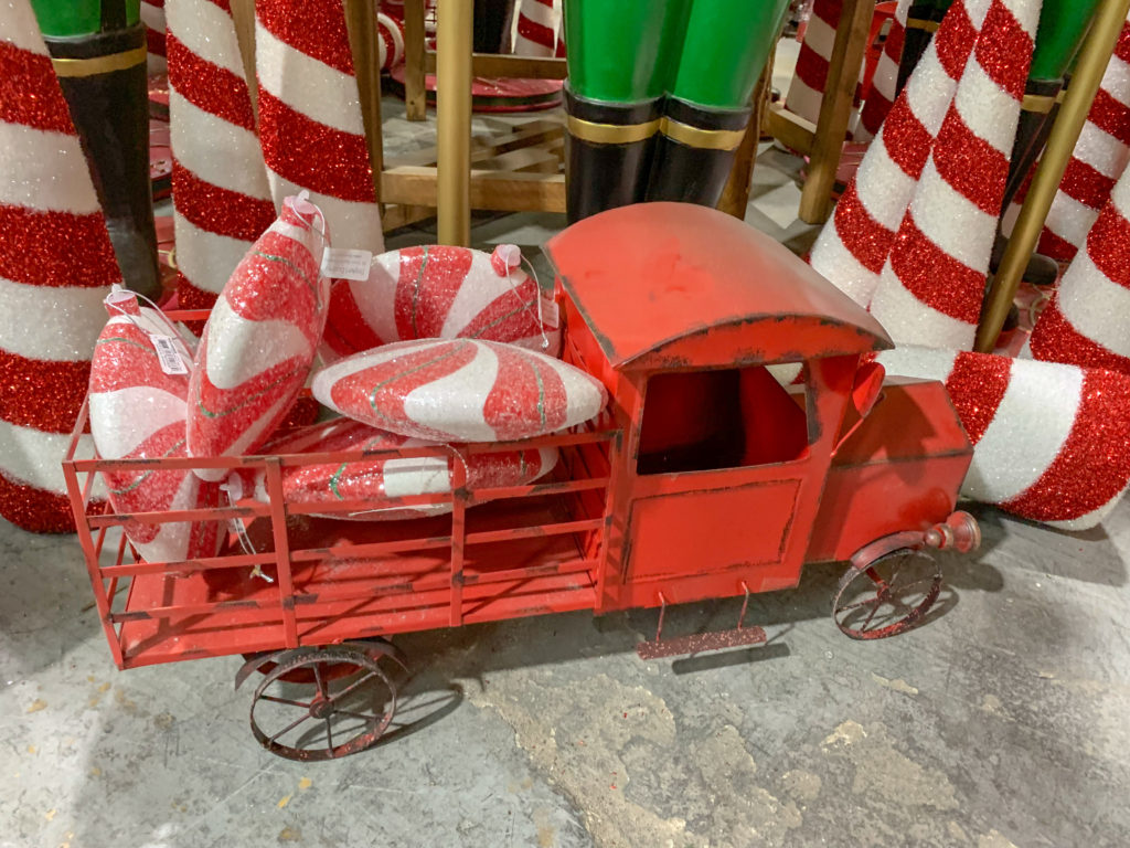 retro metal truck with candy cane Christmas decorations
