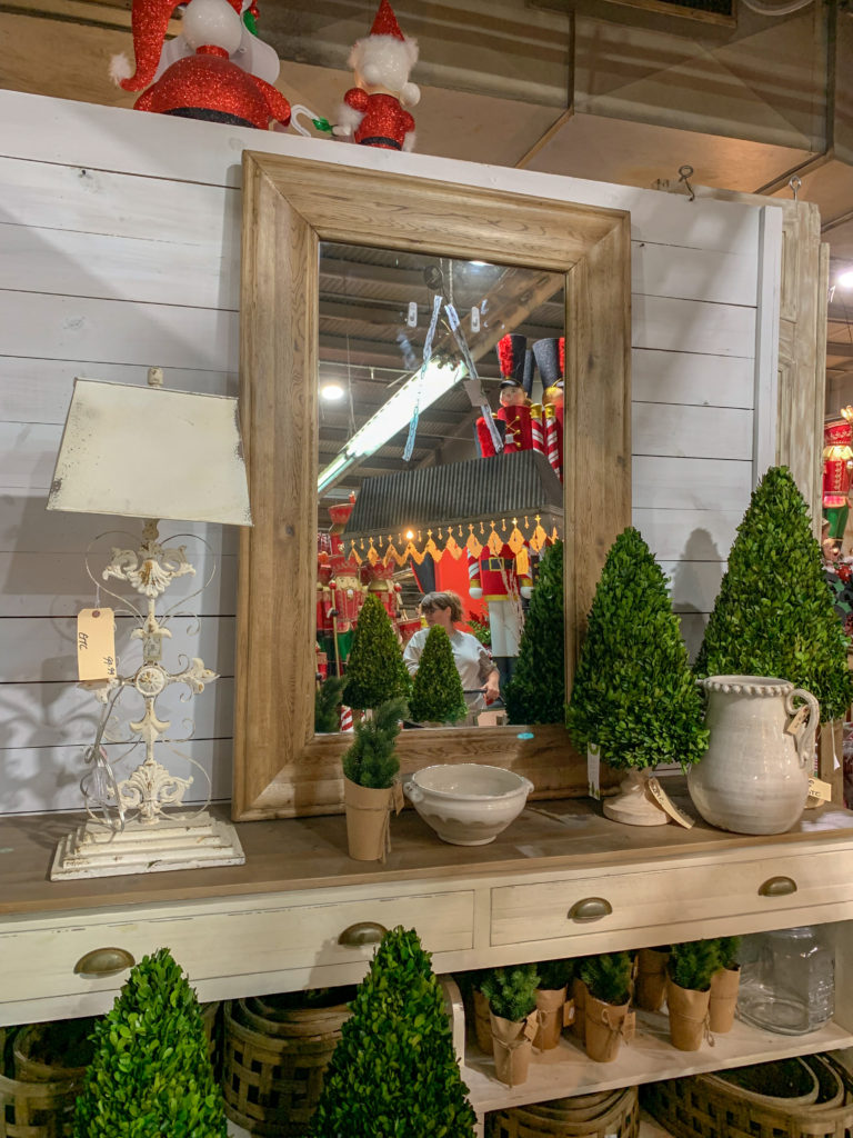 farmhouse Christmas decorations on sidebar in dining room set up at Guess and Company