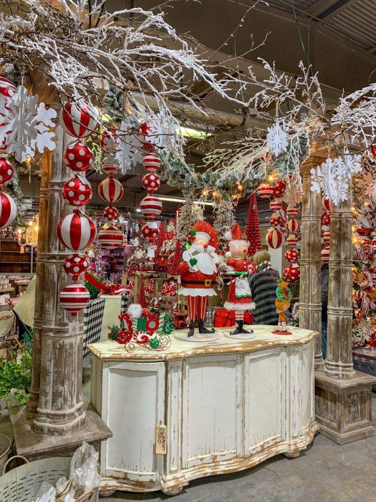 Santa decorations with Santa Claus figurines at Guess and Company