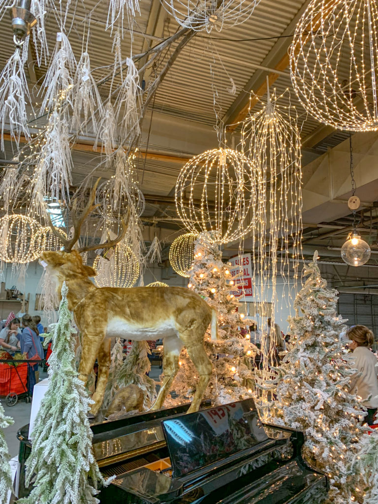 deer figuring with glowing Christmas spheres in Christmas display