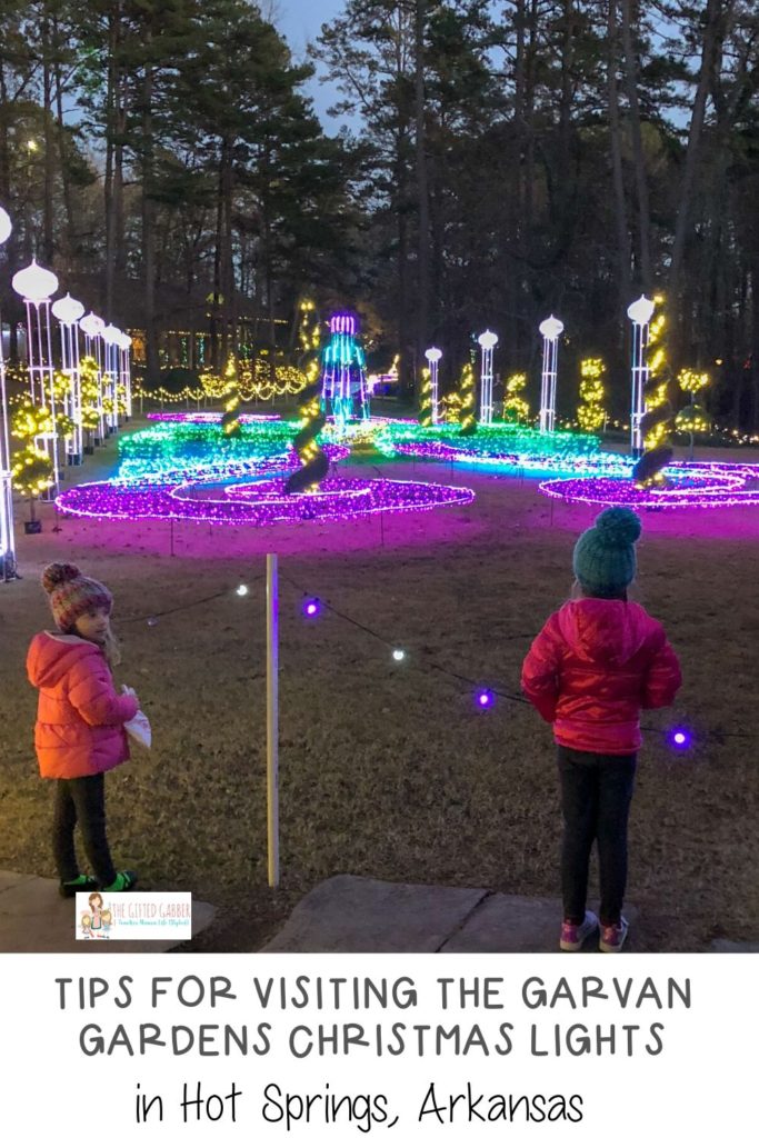 little girls looking at Garvan Gardens holiday lights 