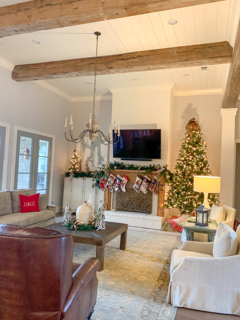 modern farmhouse living room with Christmas tree
