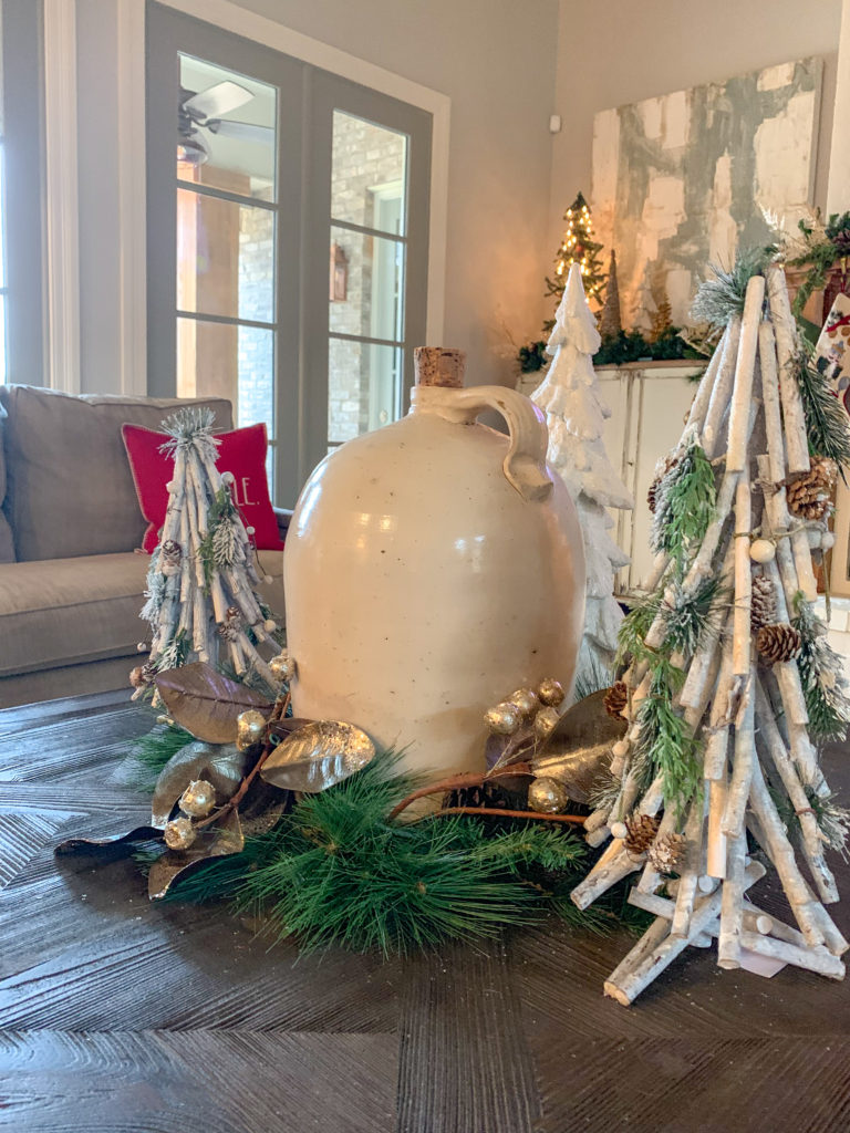 pottery jug and natural Christmas trees in a farmhouse Christmas decorations