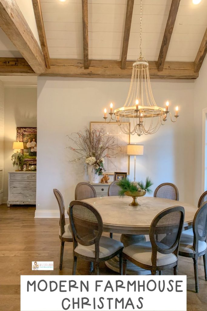 modern farmhouse Christmas in dining room with real wood beams
